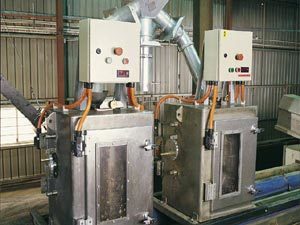 Sophisticated machinery removes the skins from the peanut kernels
